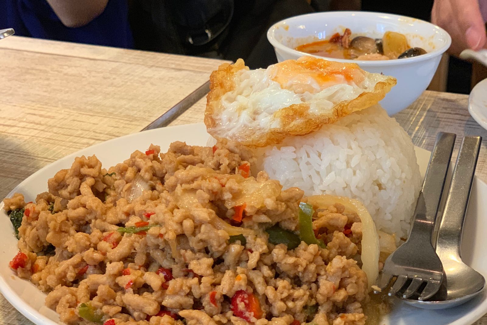Pad kra pao, basil stir-fry with rice and a fried egg