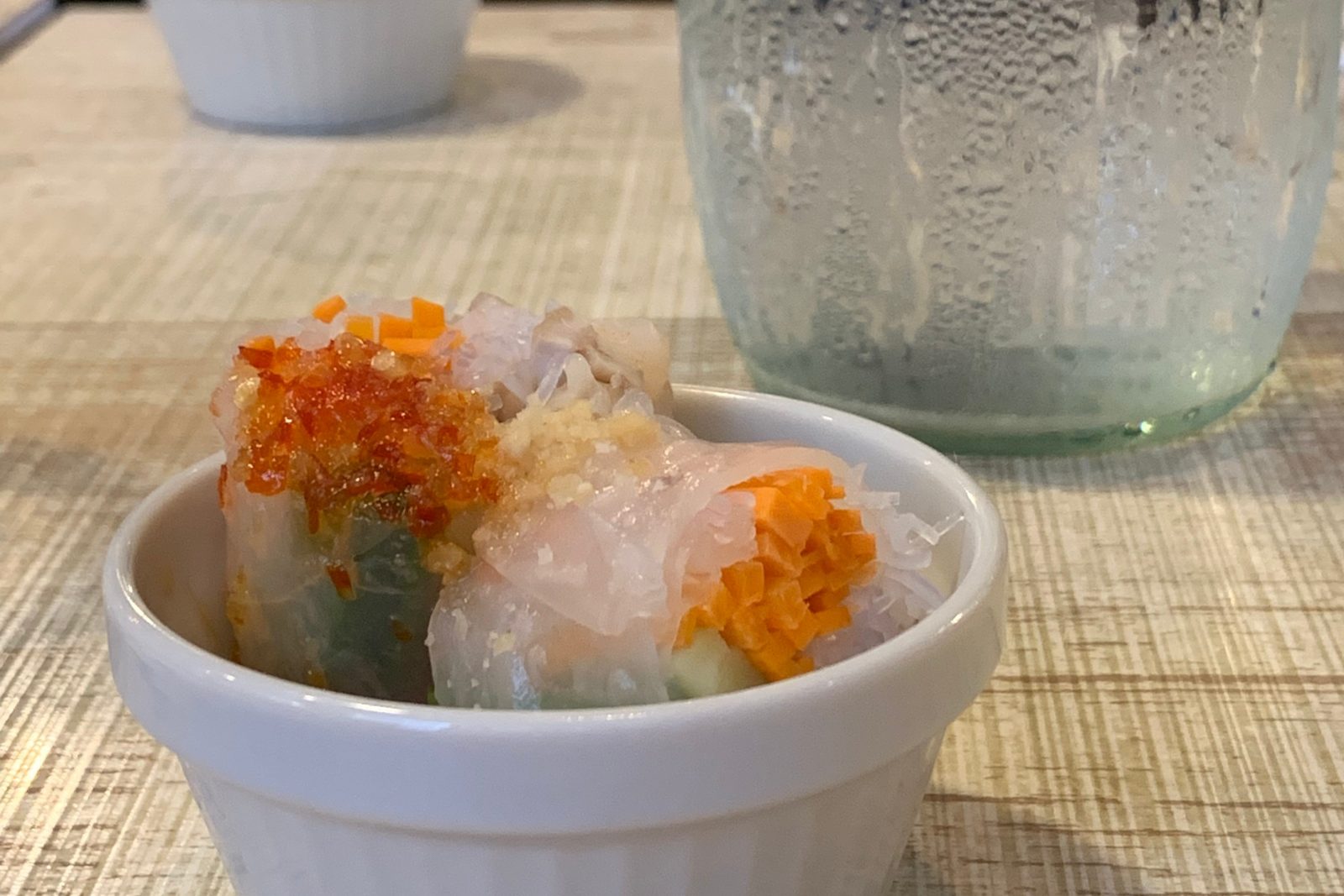 Fresh spring rolls in a small bowl