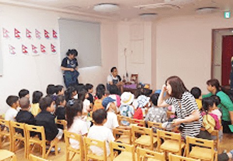 A class of young children seated in rows during a LunchTrip Flight