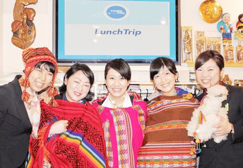 LunchTrip crew in traditional Andean clothing at a Flight